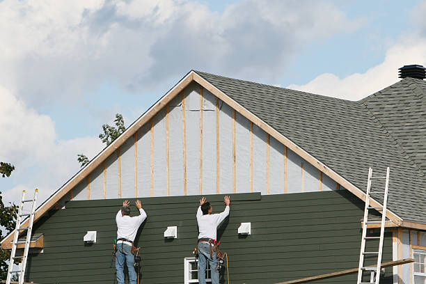 Professional Siding Replacement technician working in Schwenksville, PA